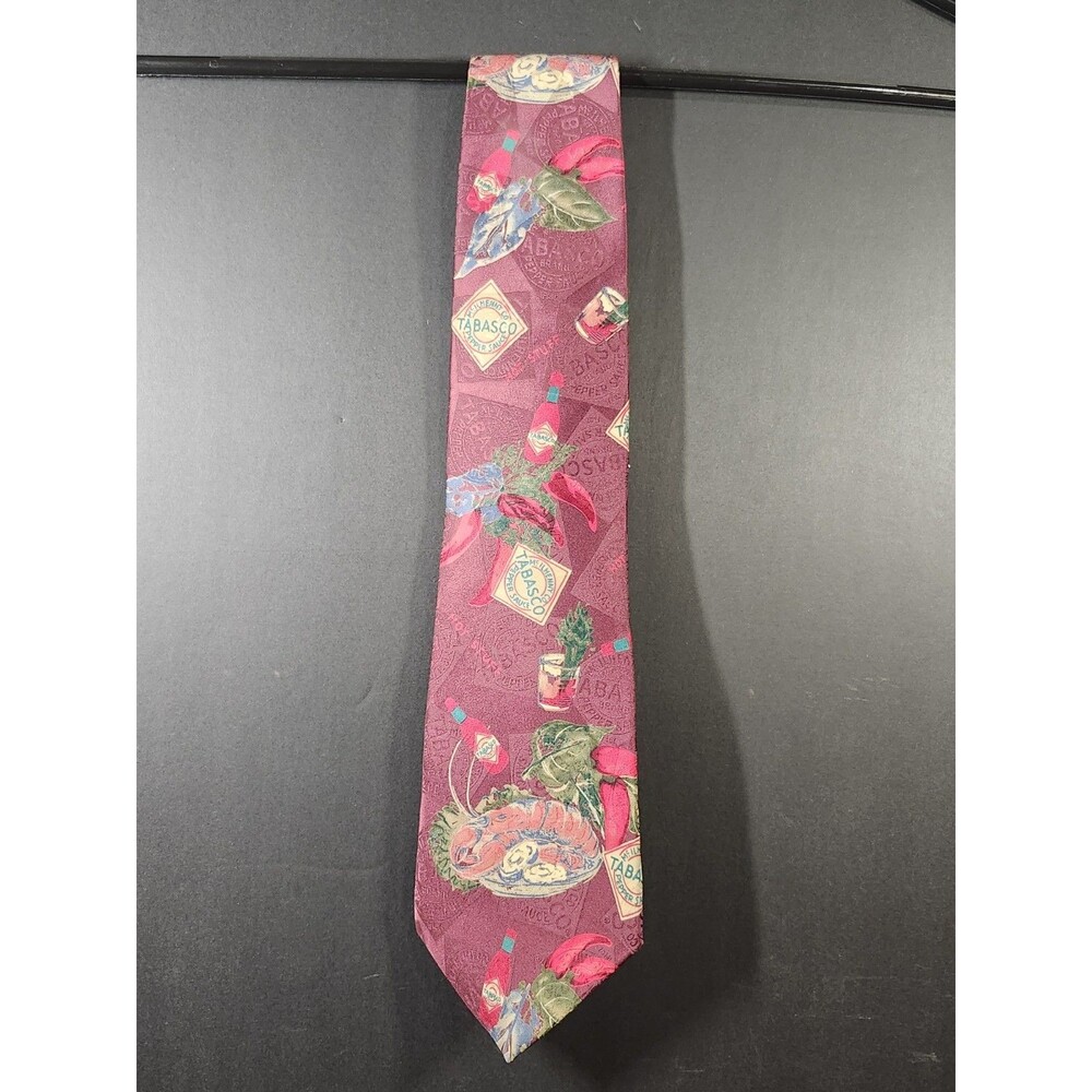 Tabasco brand necktie is made of 100% silk and features a burgundy base with...